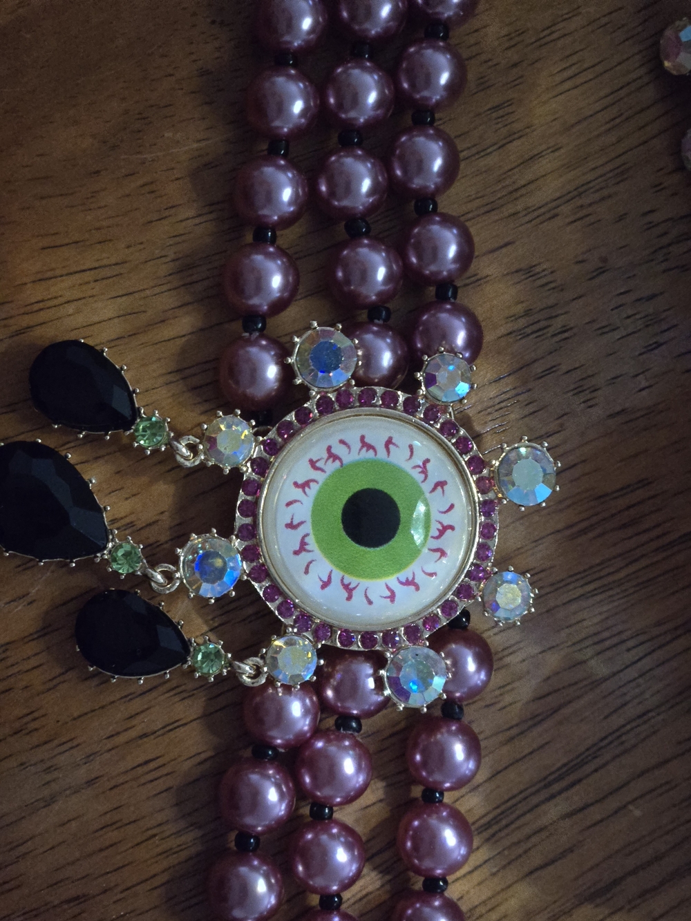 Betsey Johnson Pink Pearl Necklace with Green Eye Pendant and Black Gems